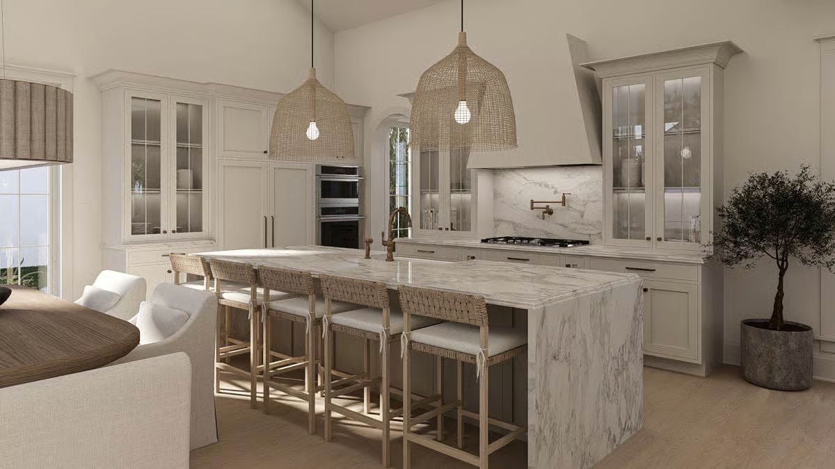 Woven Pendants and Marble Countertops Set the Tone in This Coastal Kitchen