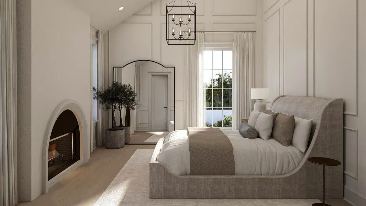 Arched Fireplace and Lantern Pendant Ground a Bedroom Built for Quiet Luxury