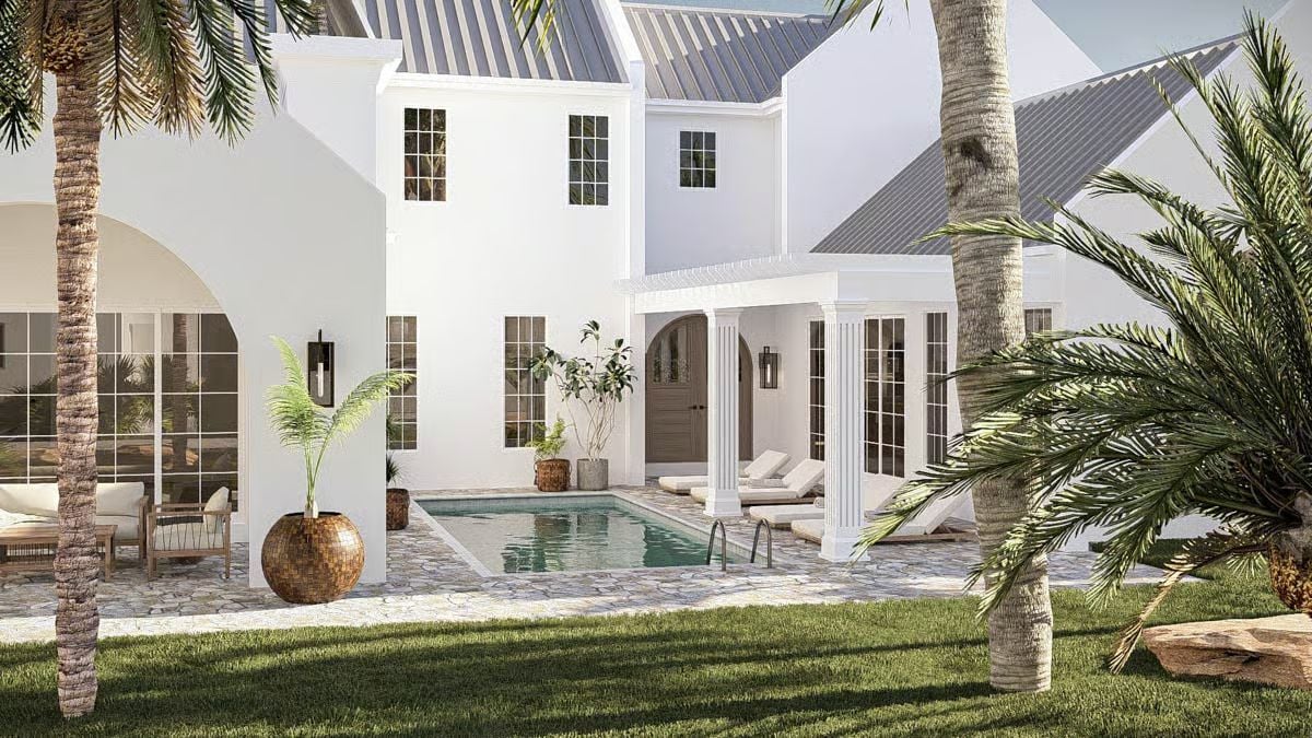 Courtyard Pool Framed by Palm Trees and White Stucco Walls