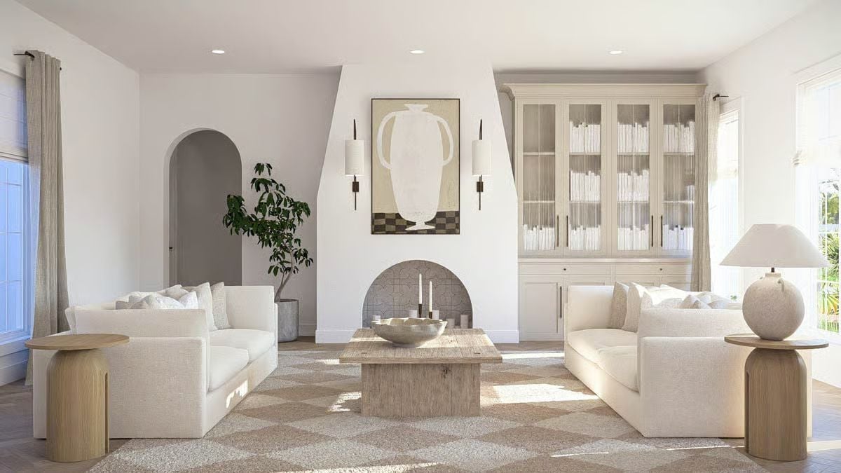 Sculptural Fireplace Surround Anchors a Living Room Built on Neutral Warmth