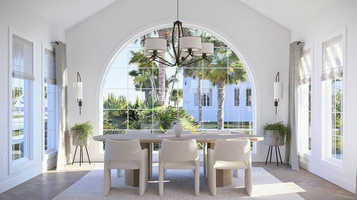 Arched Window Dining Room Channels Tropical Light Through Bouclé and Bleached Oak