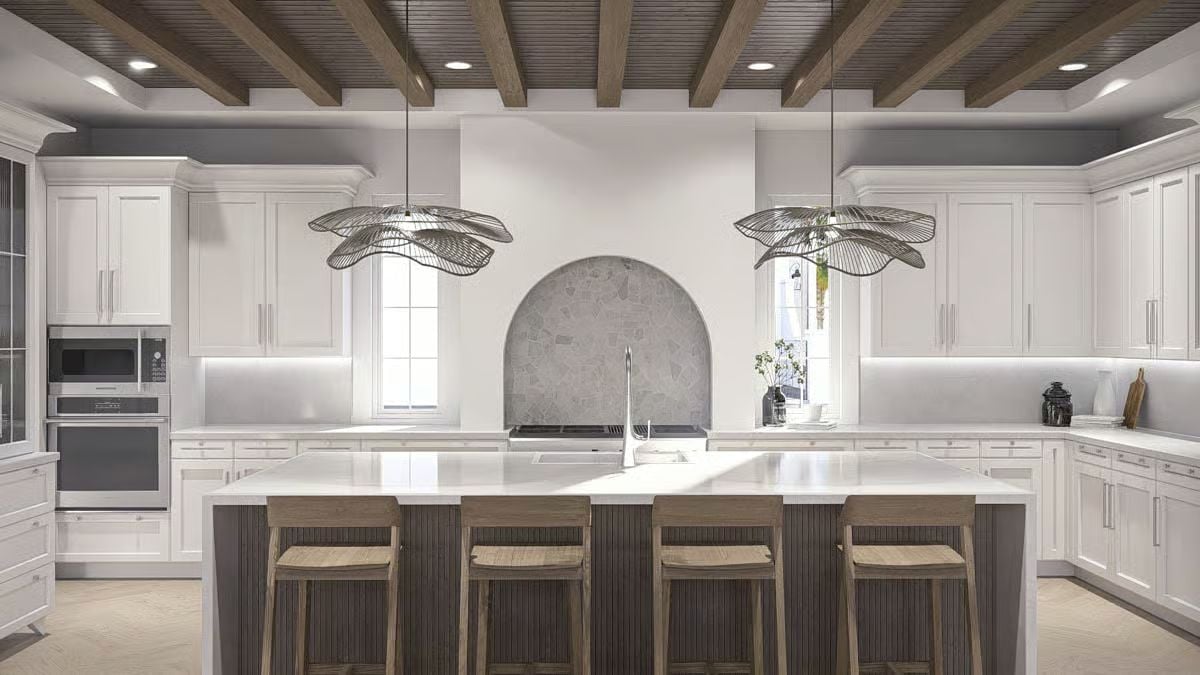 Leaf-Shaped Pendants and an Arched Stone Alcove Define This Kitchen's Character