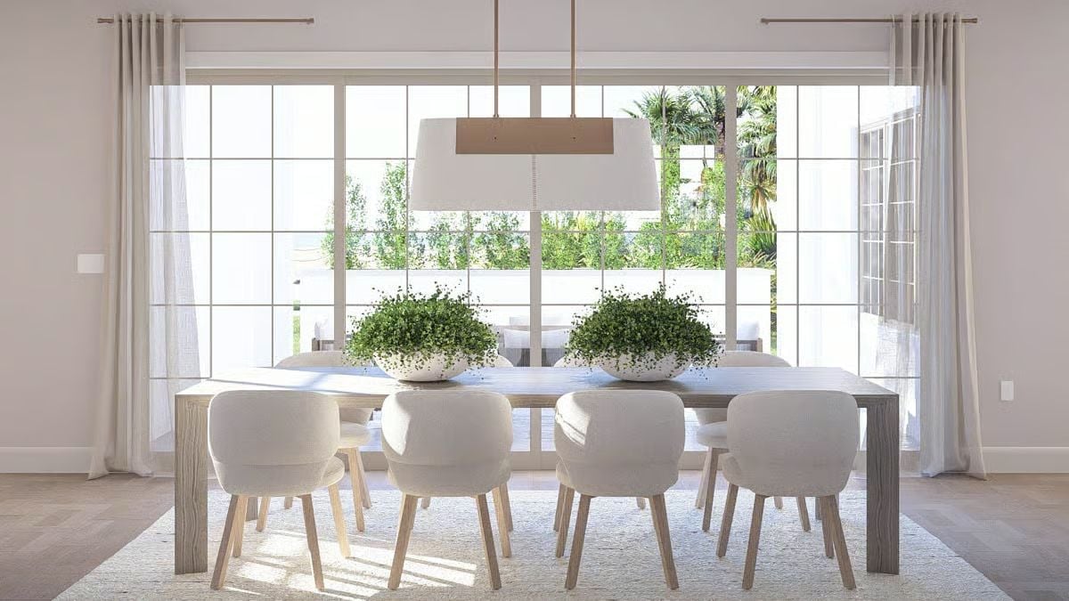 Soft Whites and Natural Wood Define This Coastal Dining Room