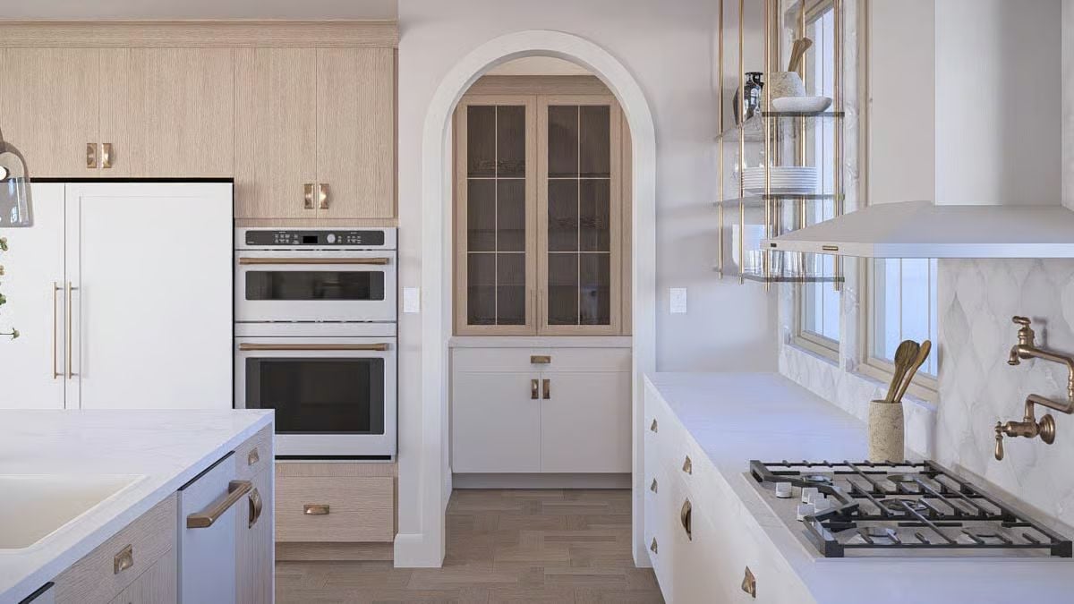 Arched Cabinet Alcove Brings Warmth to This White-and-Wood Kitchen