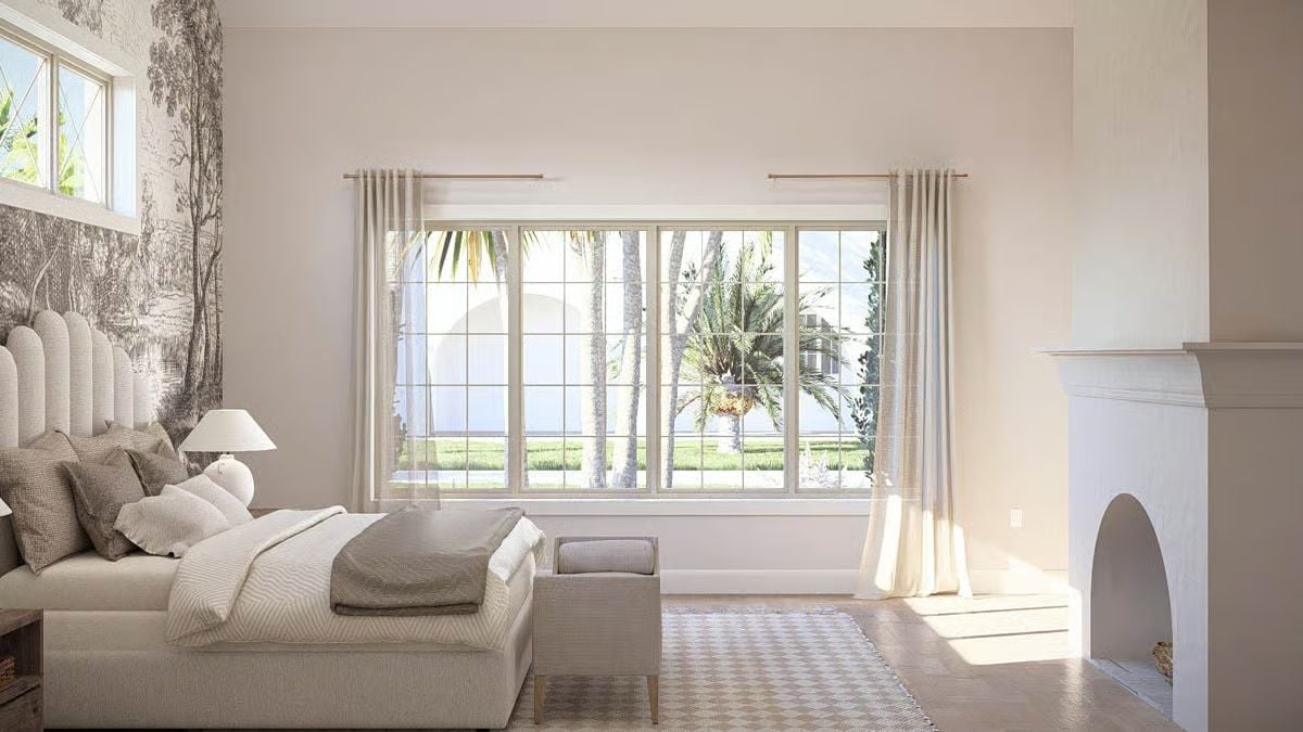 Toile Wallpaper and Palm Views Give This Bedroom Coastal Character