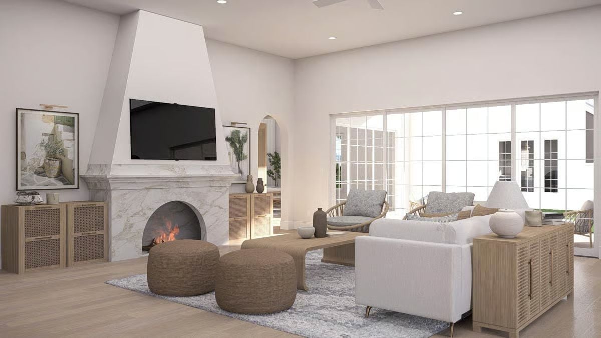 Marble Fireplace Anchors a Soft, Neutral Living Room with Coastal Ease
