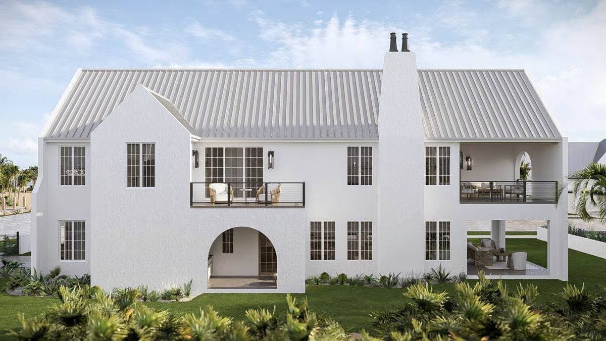 White Stucco Exterior with Dual Balconies and Arched Ground-Level Entry