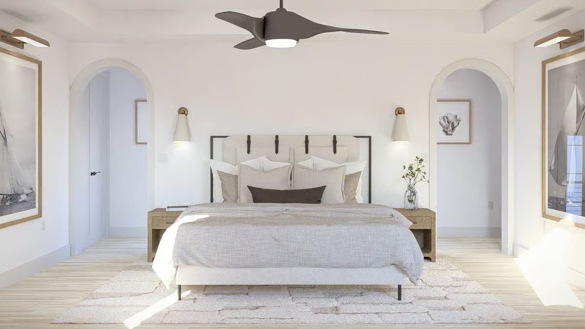 Pendant Sconces, Arched Alcoves, and Layered Linens Make This Bedroom Feel Like a Retreat