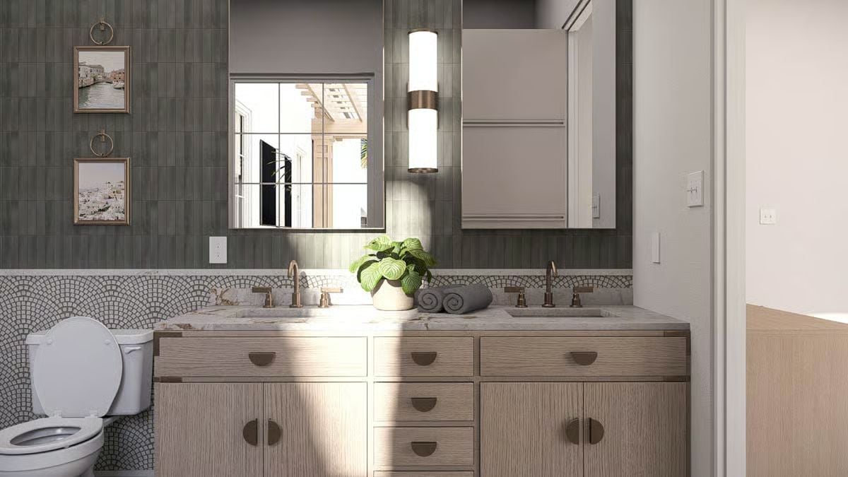 Mosaic Tile Backsplash and Double Sinks Define This Jack and Jill Bathroom