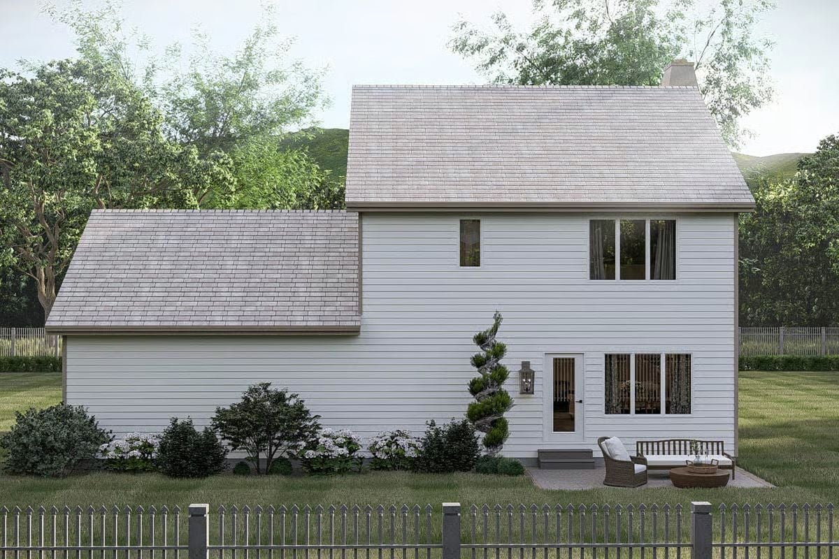 Crisp White Siding Meets a Gravel Patio on the Side Elevation