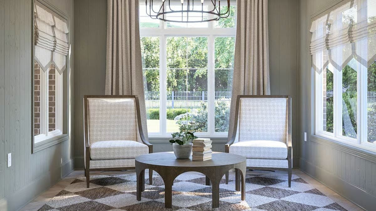 Roman Shades and Linen Drapes Frame a Sun-Drenched Sitting Alcove