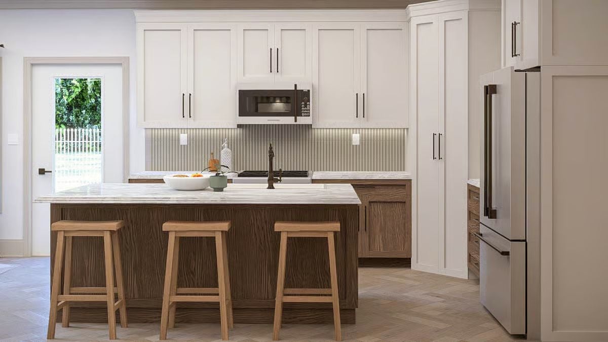 Marble Island and Wood Tones Set a Calm, Layered Kitchen Tone