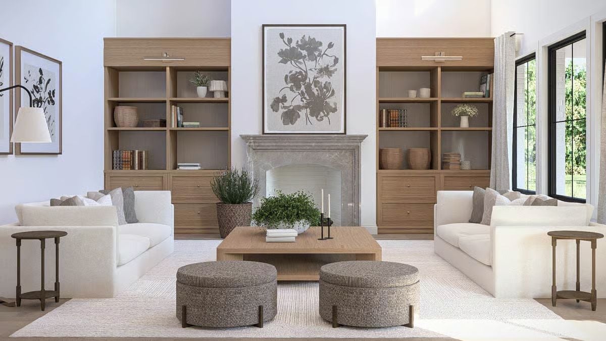 Warm Oak Built-Ins Frame a Marble Fireplace in This Symmetrical Sitting Room
