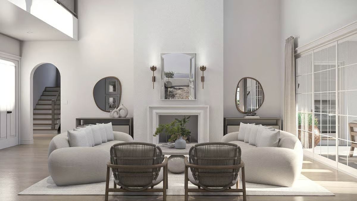 Sculptural Sofas and Woven Chairs Around a White Fireplace