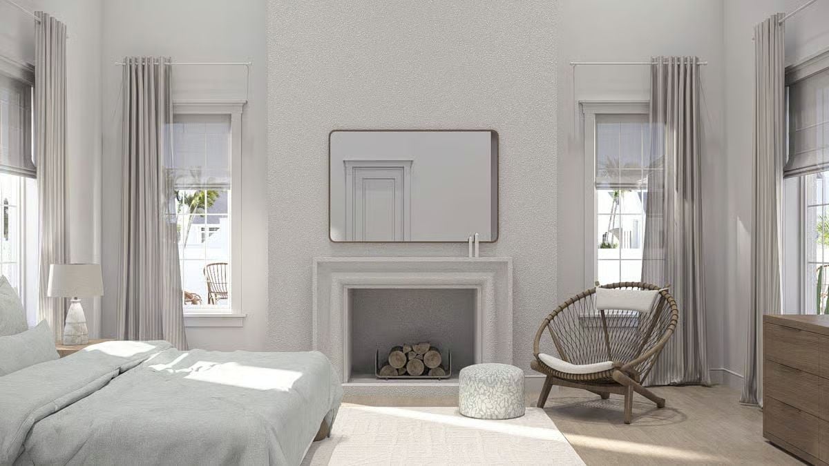 Fireplace Flanked by Windows in a Soft Coastal Bedroom