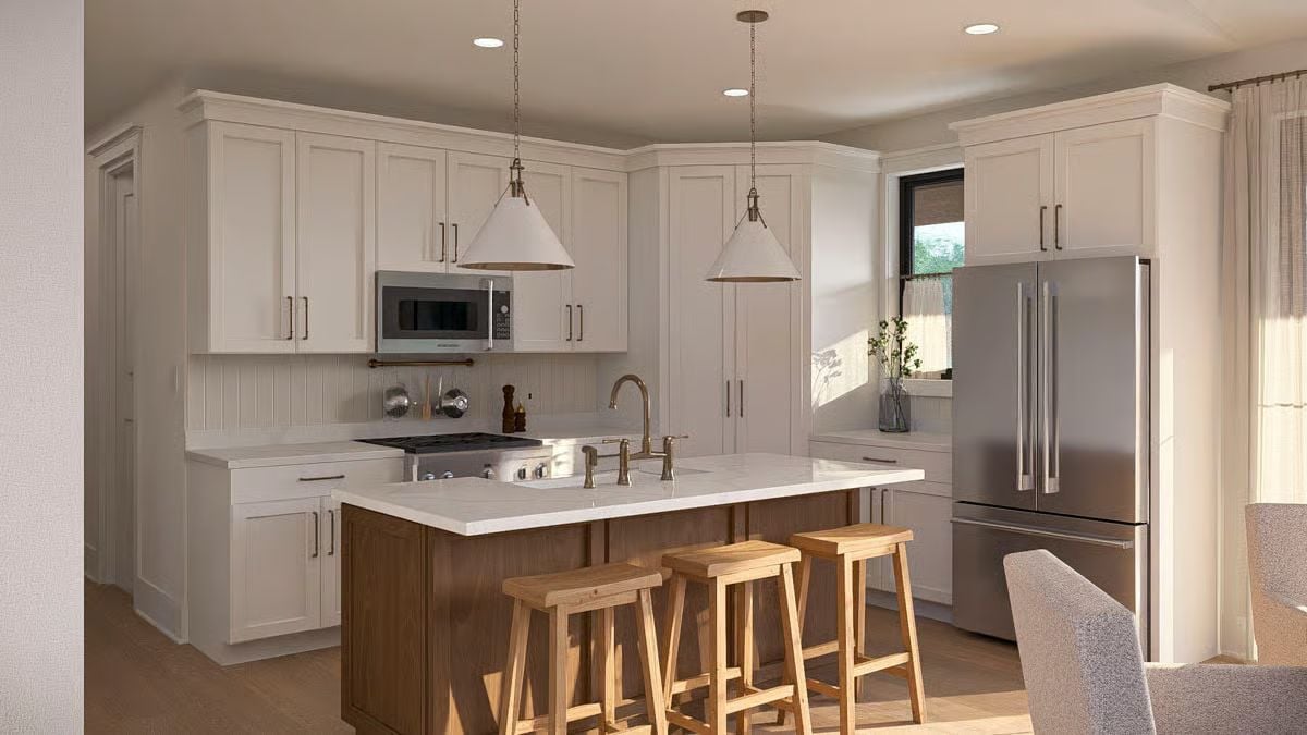 Walnut Island Base and Brass Faucet Pull Focus in This Open Kitchen