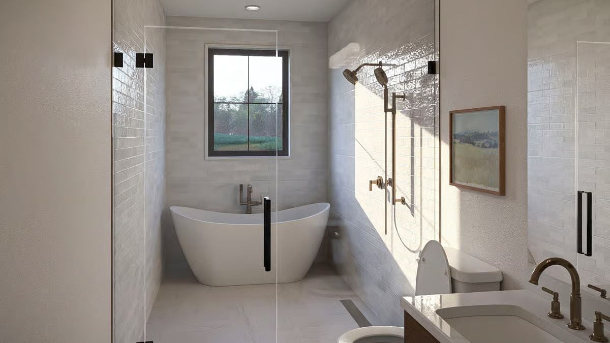 Freestanding Tub, Brass Fixtures, and Glass That Opens the Whole Room Up