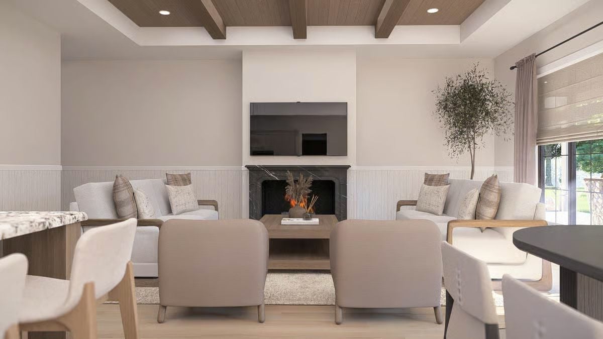 Coffered Beams and a Marble Fireplace Make This Living Room Work Hard