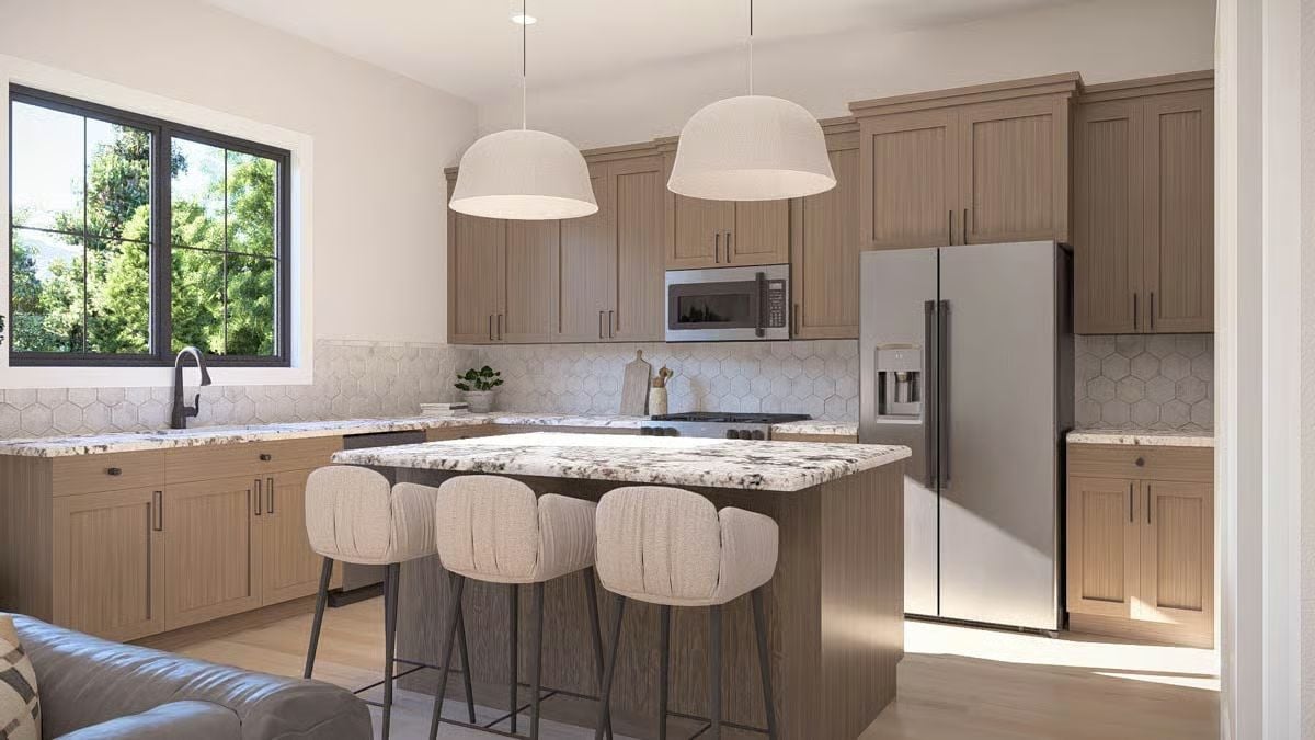 Hexagonal Tile Backsplash and Granite Island Pull This Kitchen Together