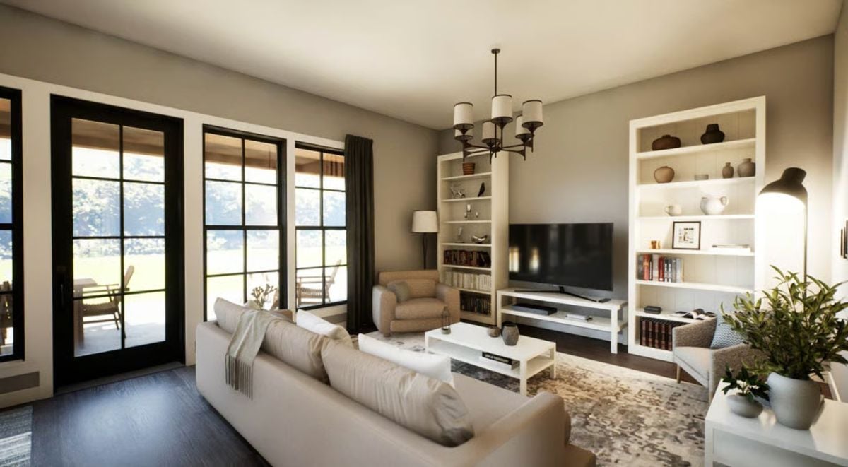 Warm Neutrals and Built-In Shelving Define This Farmhouse Living Room
