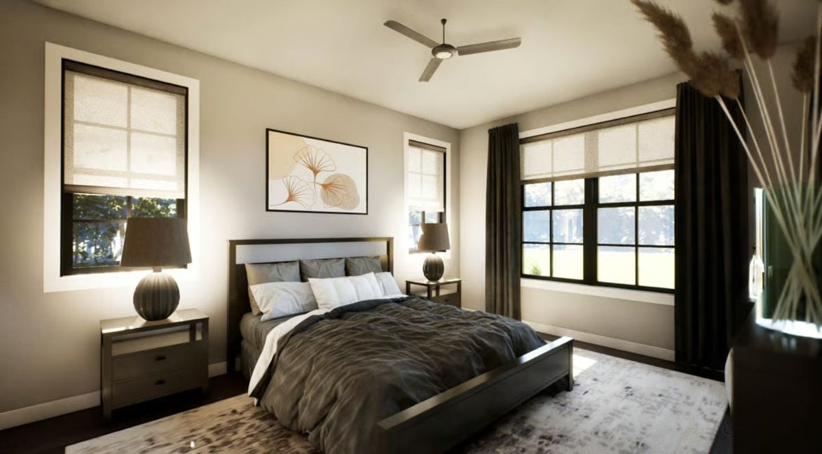 Dark Wood, Gray Bedding, and Ceiling Fan Anchor This Farmhouse Bedroom