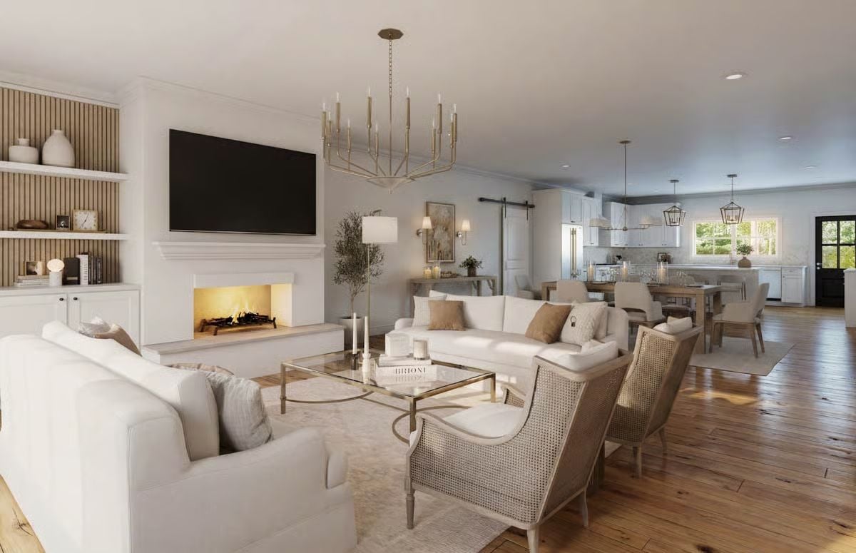 Rattan Chairs and a Glass Coffee Table Anchor This Open-Plan Living Space