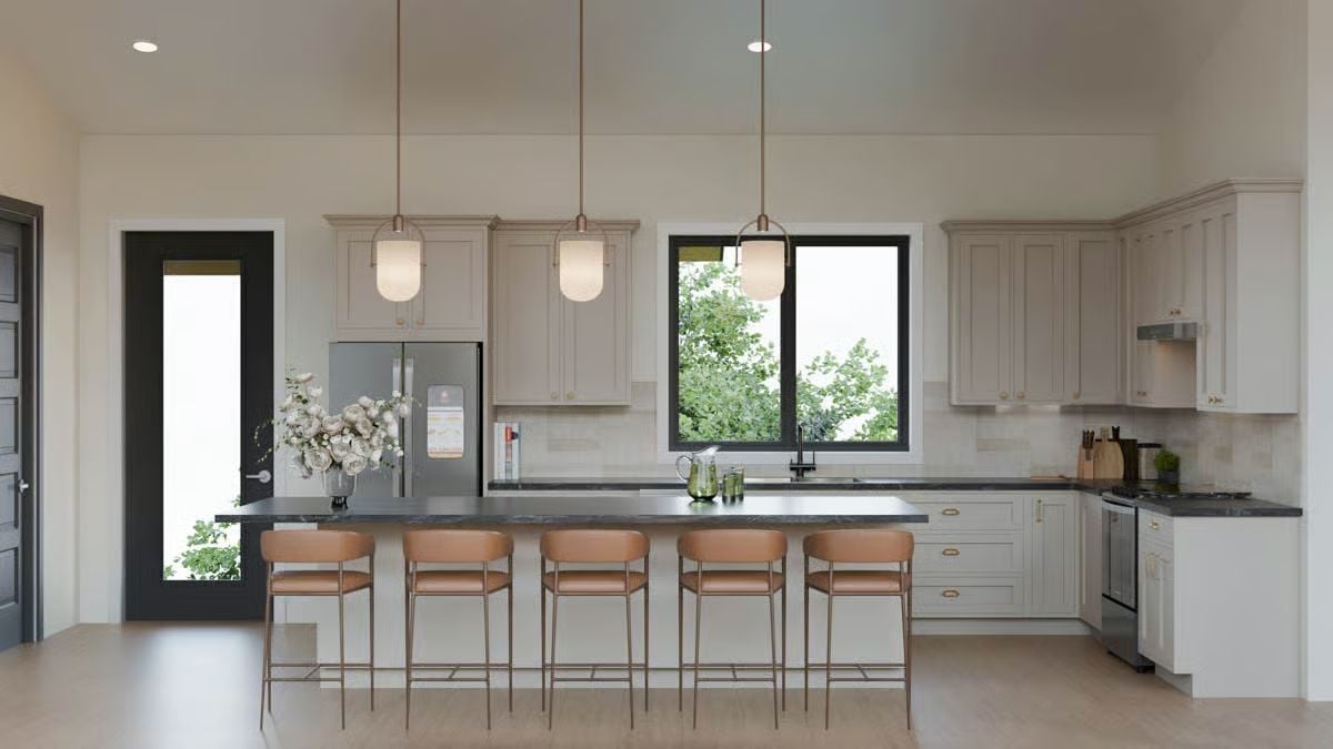 Warm Leather Barstools and Dark Stone Counters Ground a White Shaker Kitchen