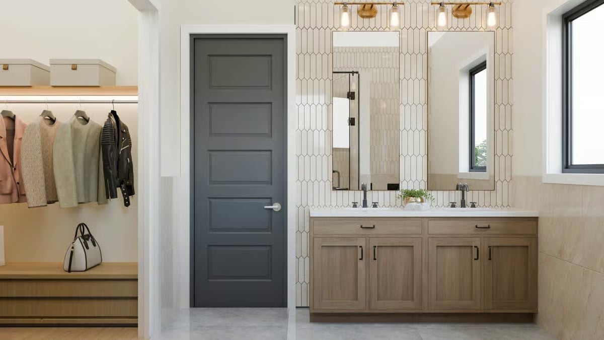 Gray Five-Panel Door Connects Walk-In Closet to a Double-Sink Vanity Bath