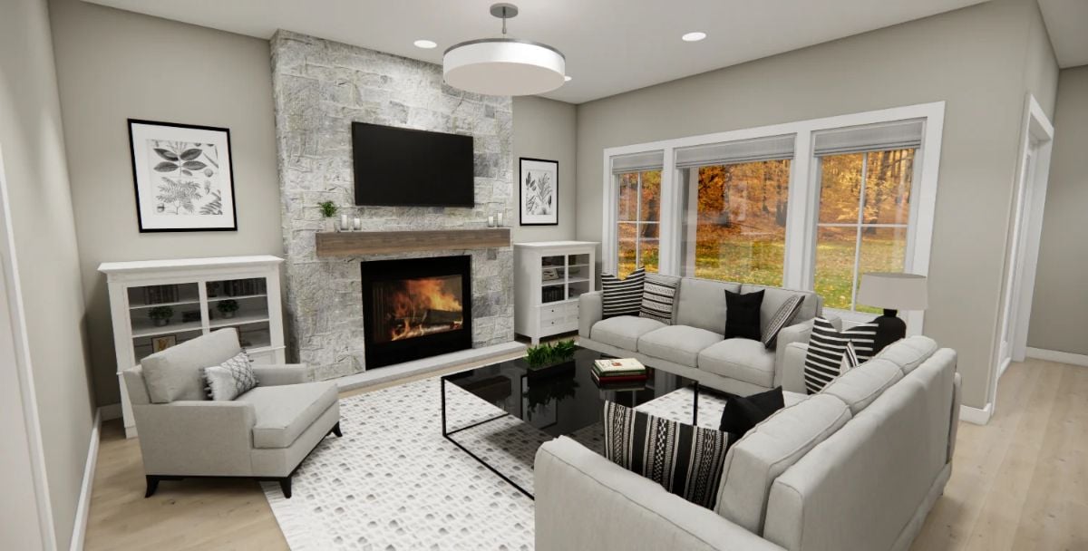 Stone Fireplace Wall Anchors a Gray and Black Living Room