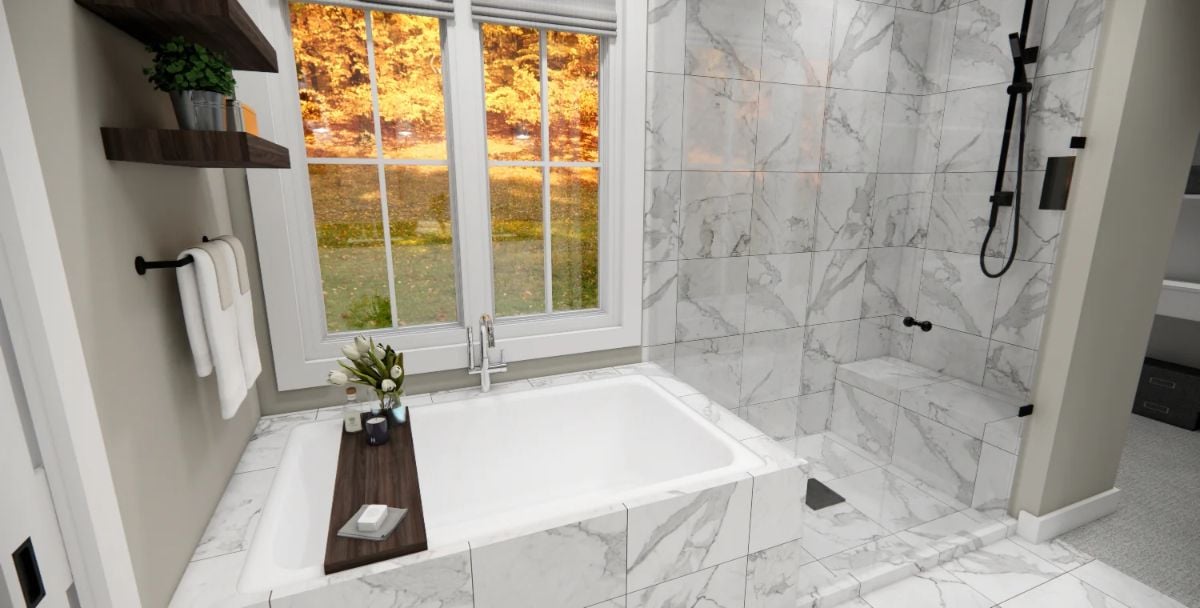 Marble-Wrapped Soaking Tub Faces Autumn Trees Through a Double Window