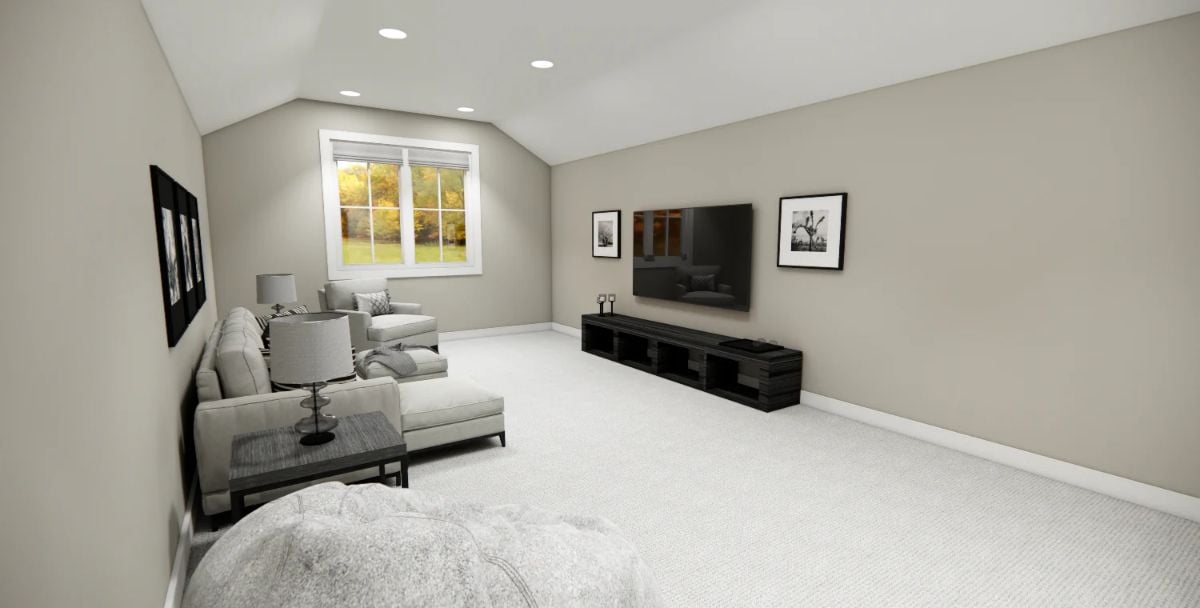 Vaulted Bonus Room Pairs Sectional Seating with a Wall-Mounted Media Setup