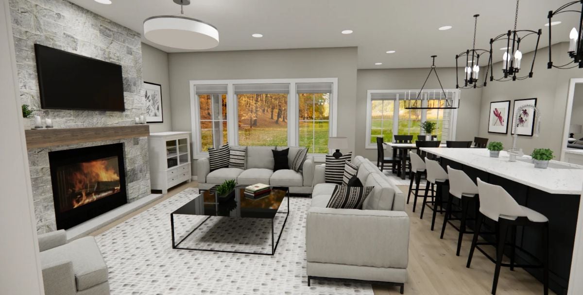 Stone Fireplace Wall Anchors an Open-Concept Living Space with Bar Seating