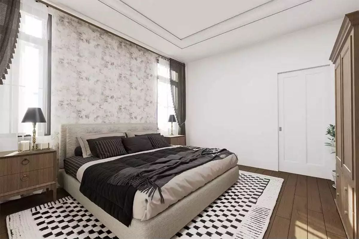Layered Neutrals and a Patterned Rug Ground This Bedroom's Quiet Confidence