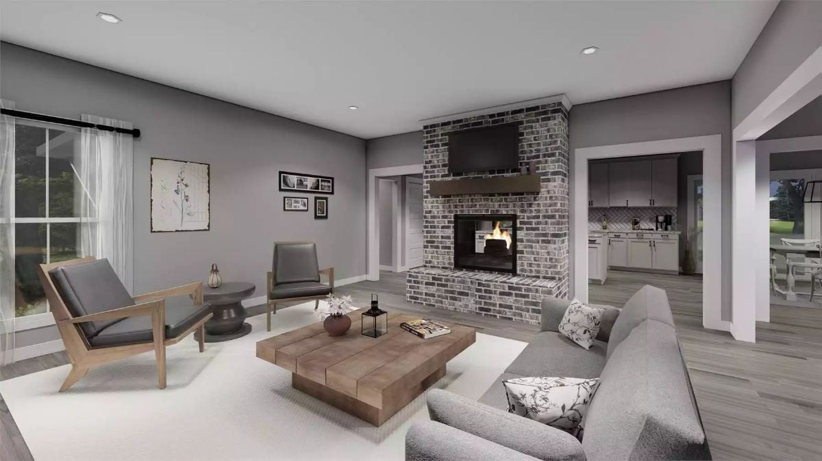 Brick Fireplace Column Commands Attention in a Gray Living Room
