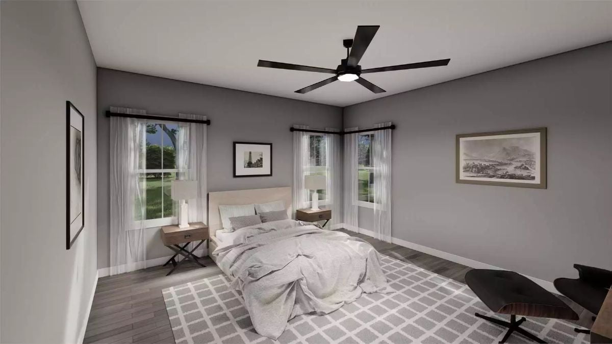 Dark Ceiling Fan and Corner Windows Shape a Restful Primary Bedroom