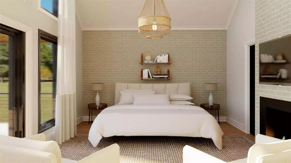Rattan Chandelier and Sage Brick Wall Set the Tone in This Primary Bedroom