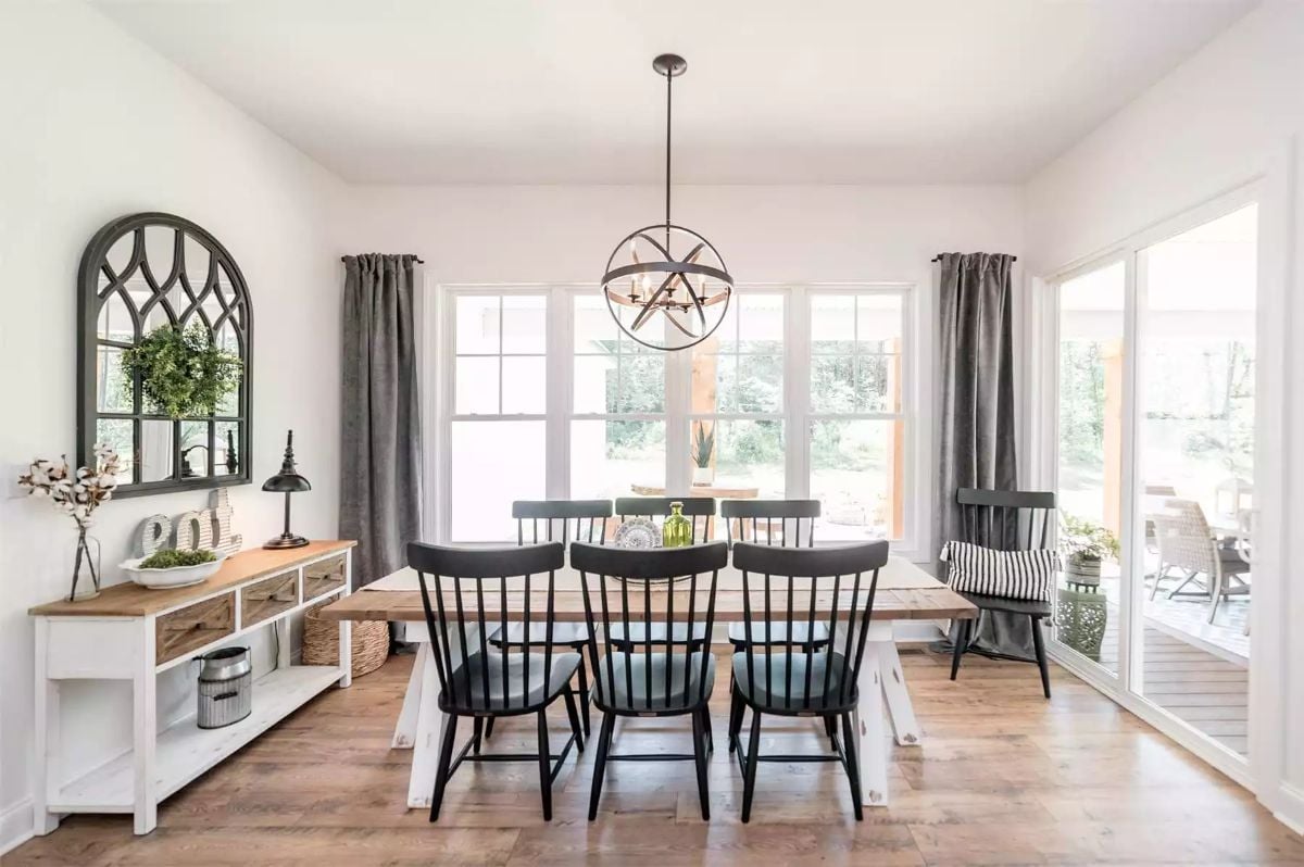 Farmhouse Dining Room Pairs Windsor Chairs with an Orb Chandelier