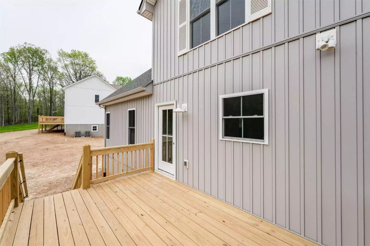 Fresh-Cut Lumber and a Side Door Make This Deck Built for Daily Use
