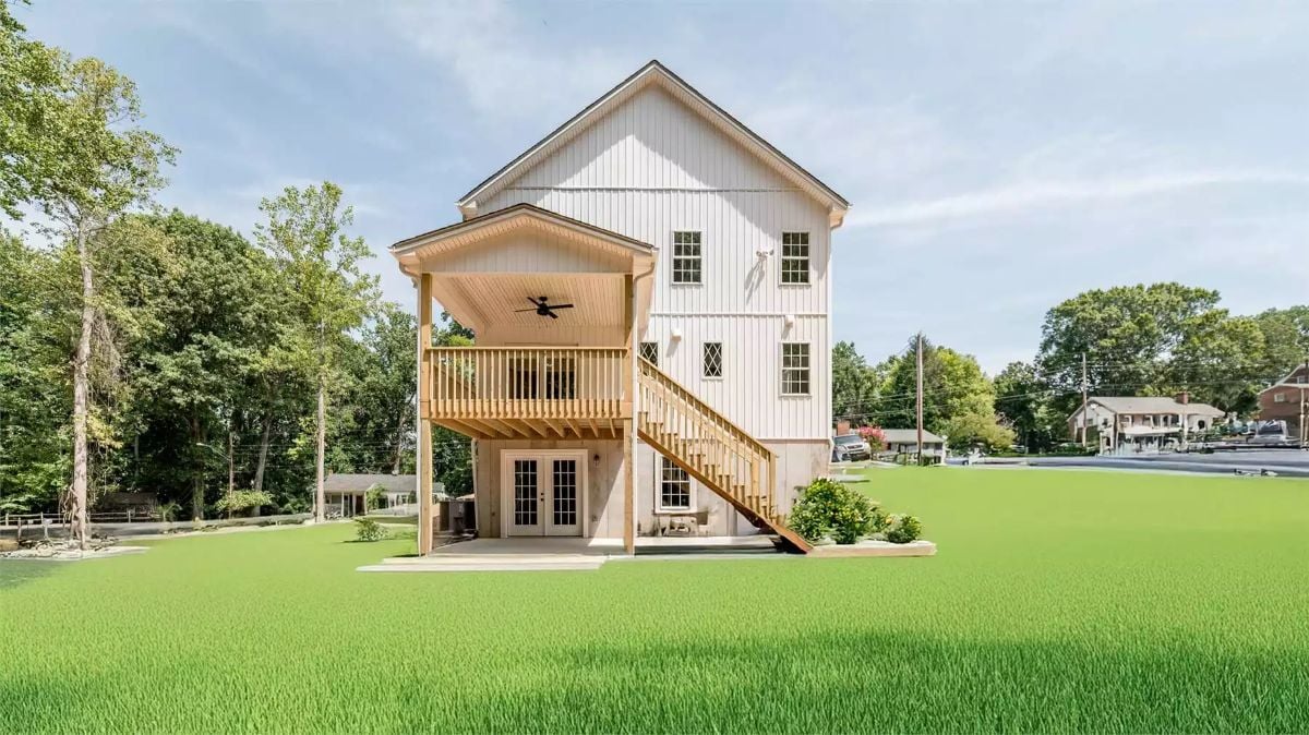 White Board-and-Batten Exterior with Covered Deck and Ceiling Fan
