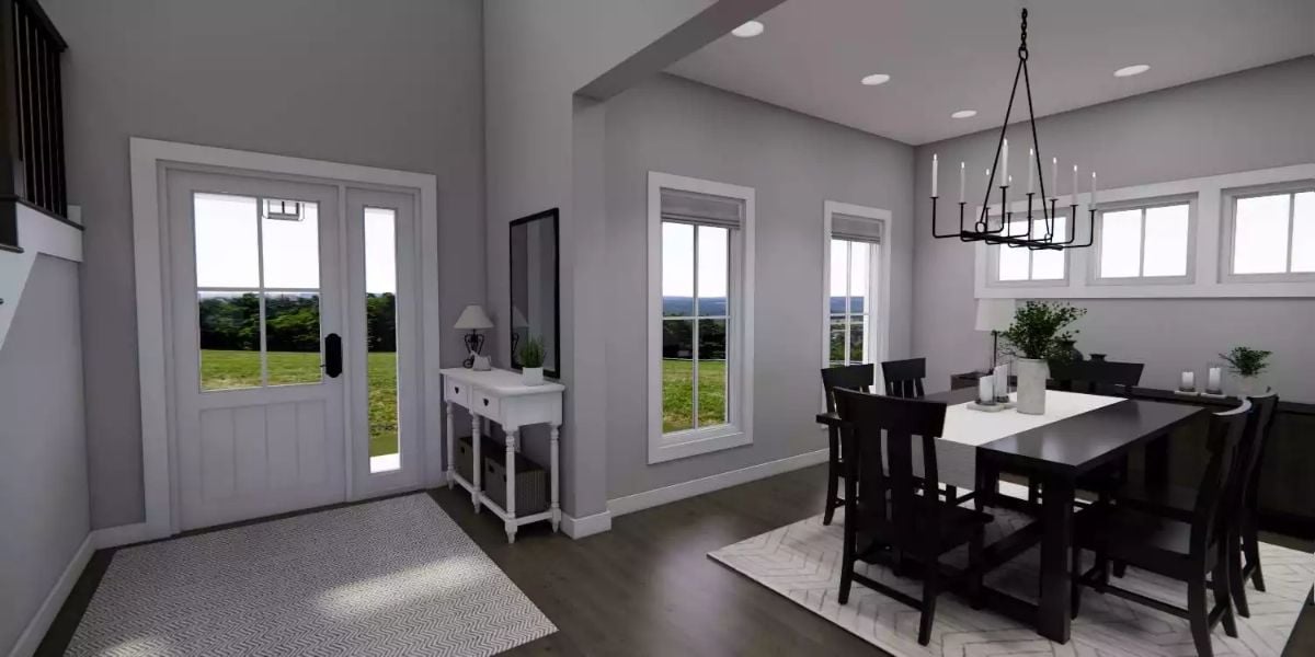 Foyer Opens Into Dining Room Beneath a Candle-Style Chandelier