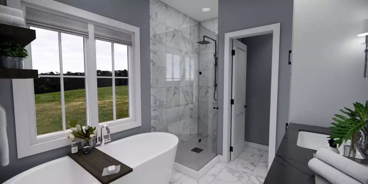 Freestanding Tub and Walk-In Shower Share Space in a White Marble Primary Bath