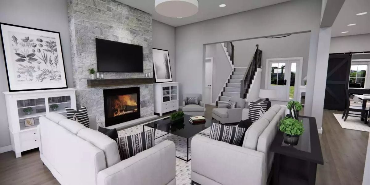 Stone Fireplace Wall Anchors a Gray-Toned Living Room with Farmhouse Edge