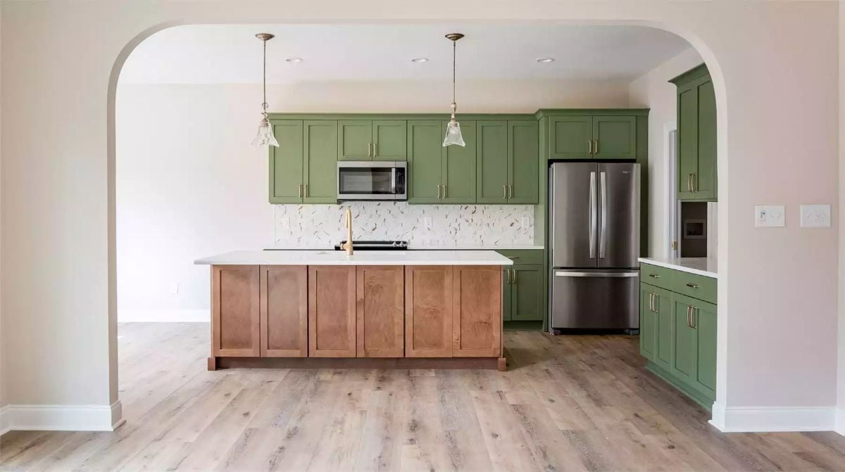 Sage Green Cabinets and a Wood Island Make This Kitchen Worth Remembering