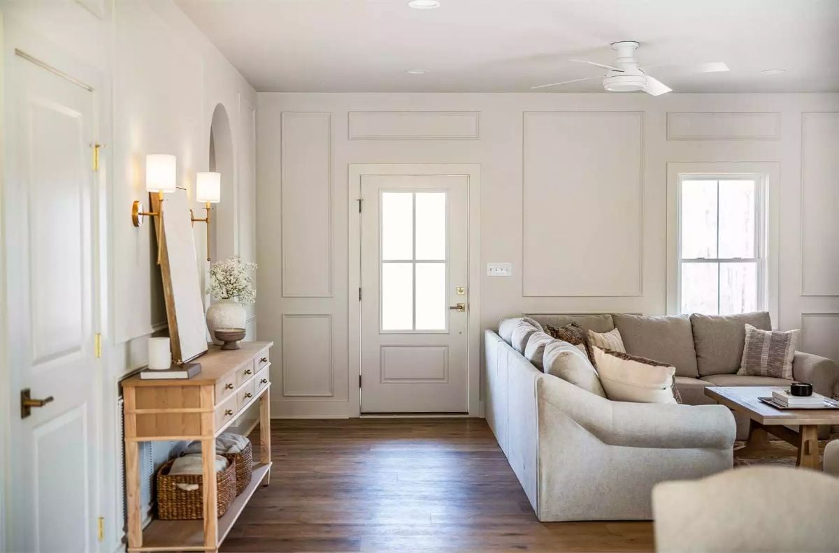 Warm Neutrals and Panel Molding Define a Welcoming Entry and Living Space