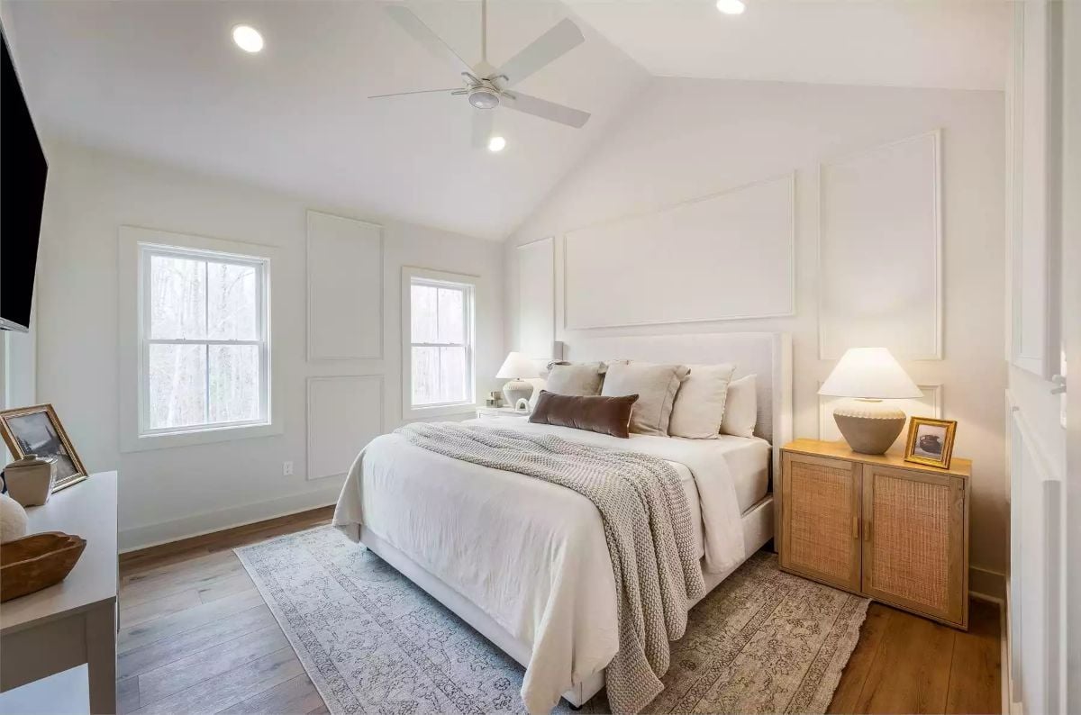 Vaulted Ceiling and Panel Molding Give This Primary Bedroom a Quiet Authority