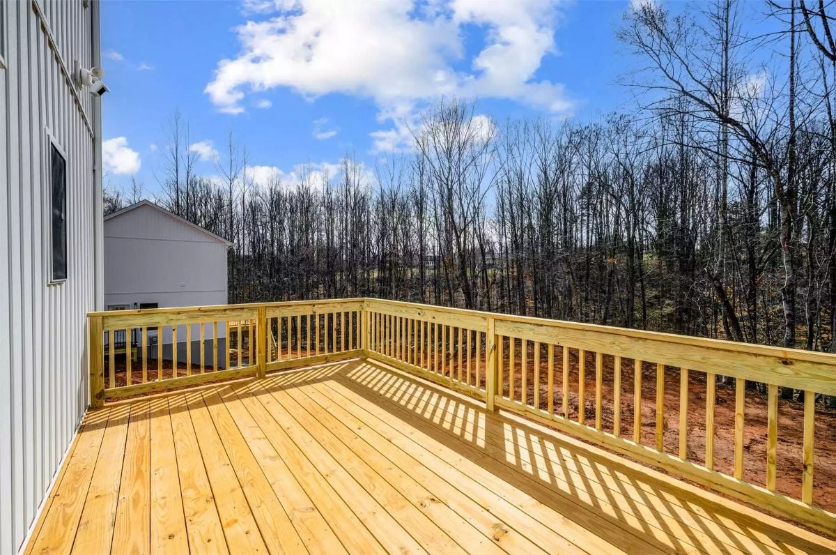 Fresh Lumber and Open Sky Make This Rear Deck Worth Every Morning