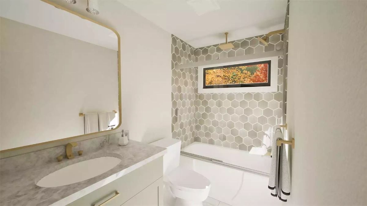 Gold Fixtures, Hexagon Tile, and a Bathtub That Actually Fits the Space