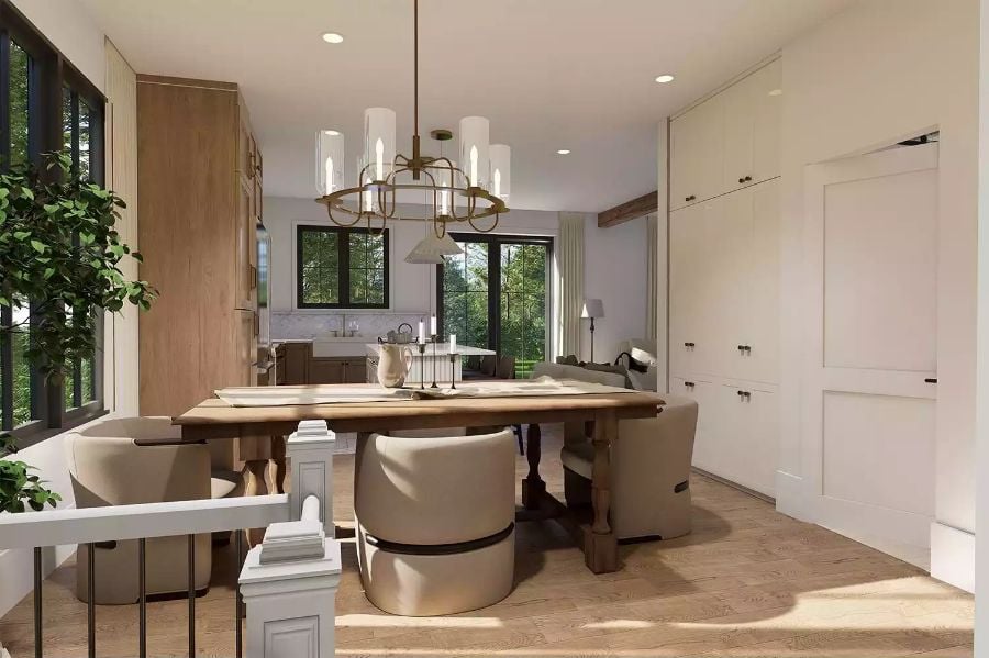 Warm Wood Tones and Barrel Chairs Define an Inviting Dining Space