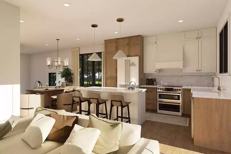 Fluted Island Panels and Layered Pendant Lighting Shape an Open-Plan Kitchen