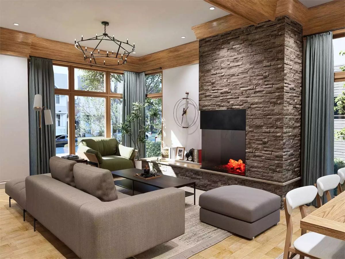 Stacked Stone Fireplace Anchors a Living Room Built Around Natural Materials
